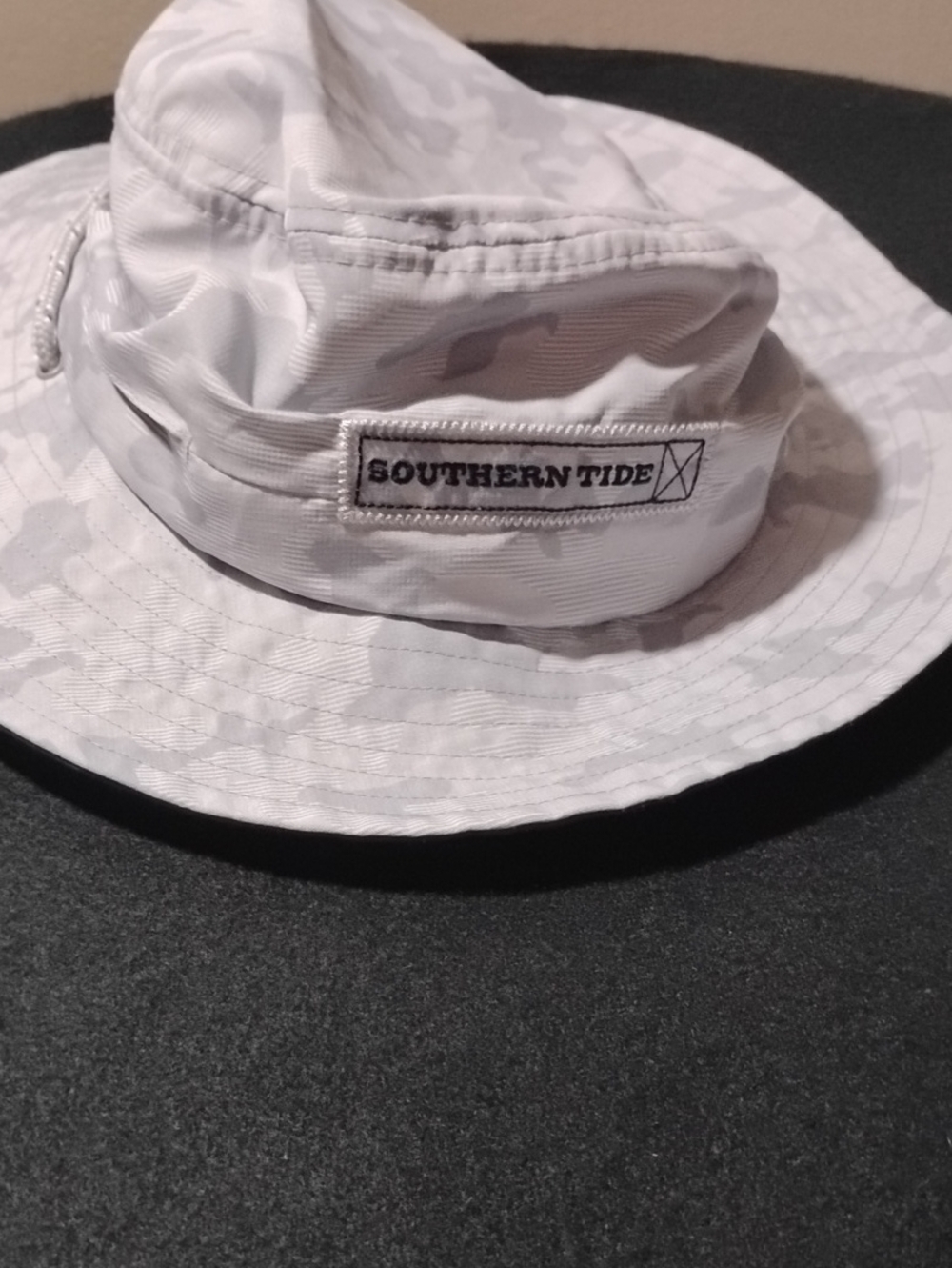 The Southern Tide Waterway Camo Print Performance Sun Hat in "Seagull Grey"